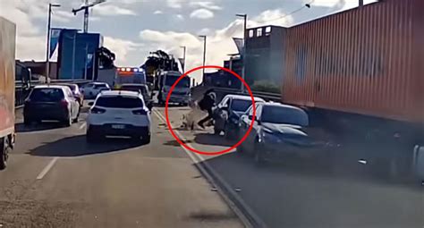 Dashcam Films Horrific Crash Before Motorcyclist Gets Run Over