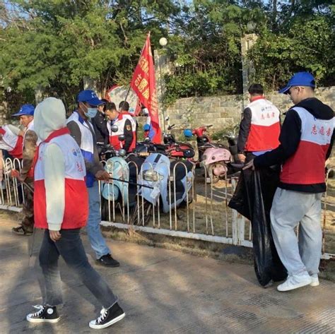 涠洲岛旅游区党史办开展旅游区党史学习教育“我为群众办实事”暨环境卫生清洁志愿者活动码头客运港涠洲岛