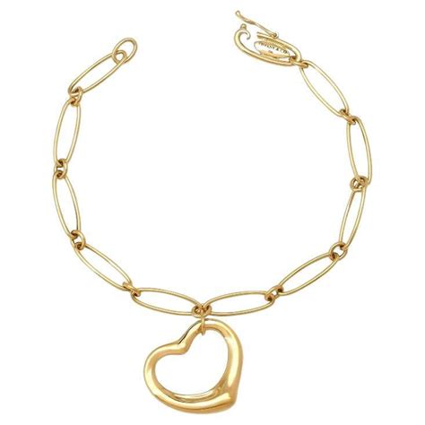 Tiffany And Co Elsa Peretti Carved Gemstone Gold Charm Bracelet At 1stDibs