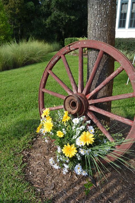 Two Men and a Little Farm: WAGON WHEEL YARD DECOR INSPIRATION THURSDAY