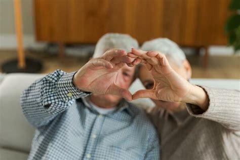 Old People Holding Hands Stock Photos, Images and Backgrounds for Free ...