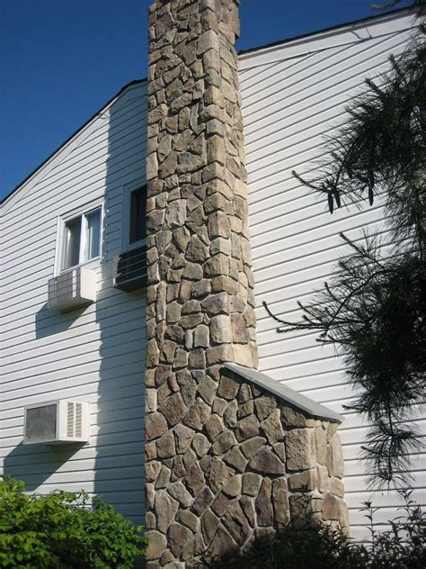 Chimney Veneered In Cultured Stone Dressed Fieldstone Bucks County