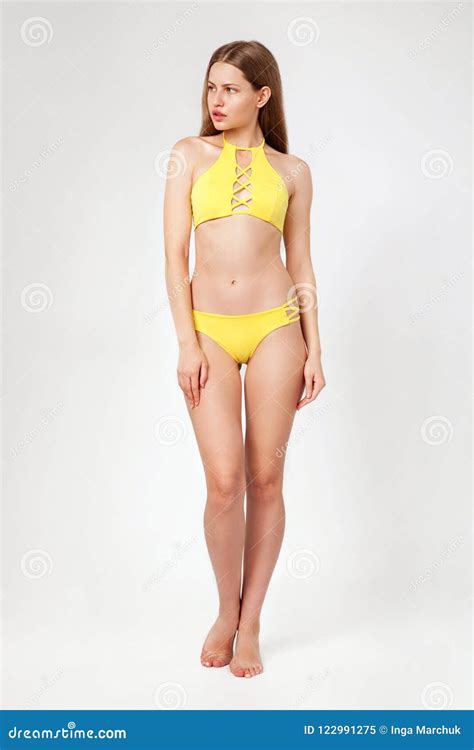 Beautiful Woman In Yellow Bikini Stock Image Image Of Blonde Beach