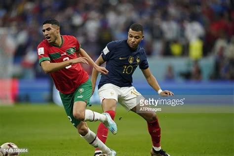 Kylian Mbappé Of France And Achraf Hakimi Of Morocco In Action During