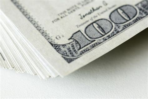 Closeup of hundred dollar bills | Premium Photo - rawpixel