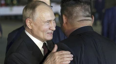 Vladimir Putin Embraced With Smiles Handshakes And Hugs From Kim Jong