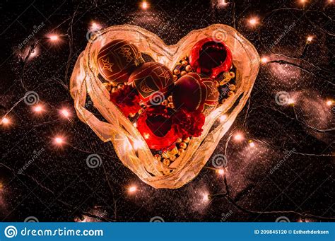 Glowing Heart with Christmas Baubles and Christmas Lights Stock Photo - Image of concept, glow ...