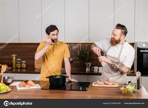 Gay Couple Cooking Vegetables Chicken Fillet Kitchen Stock Photo HayDmitriy 643341200