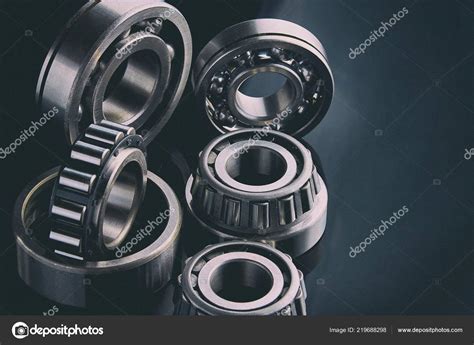 Close Set Ball Roller Bearings Repair Lying Desktop Dark Can Stock Photo by ©coloritmail 219688298