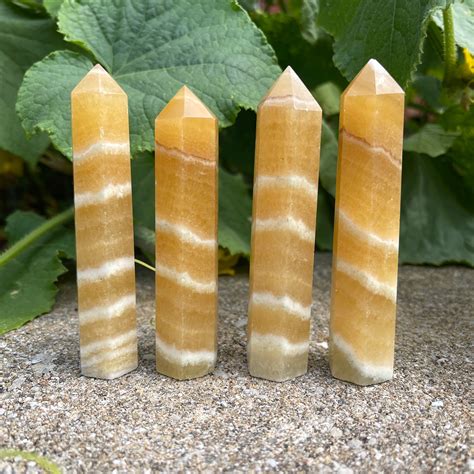 Orange Banded Calcite Points Aura Salt Cave And Wellness