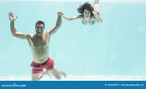 Couple Enjoying Underwater In Swimming Pool Stock Image Image Of Looking Holiday 66960093