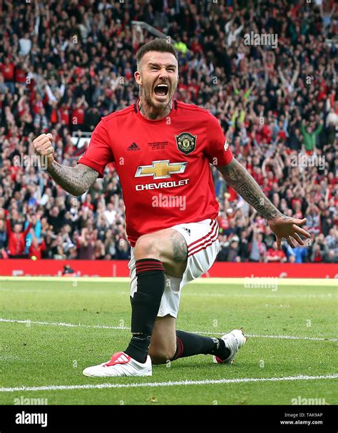 Manchester United Legends David Beckham celebrates scoring his side's ...