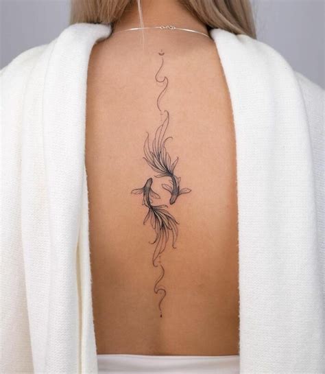 Pisces Spine Back Tattoo In Small Tattoos Back Tattoo Tattoos