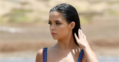 Demi Rose Mawby Sizzles In The Sunshine As She Splashes In A Volcanic Lake In Bold Bikini