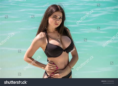 Стоковая фотография 1029093052 Young Sexy Woman Black Bikini On Shutterstock