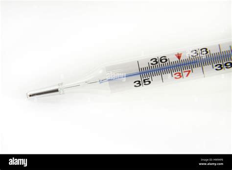 Medical thermometer indicating temperature 37.8 Celsius degrees ...