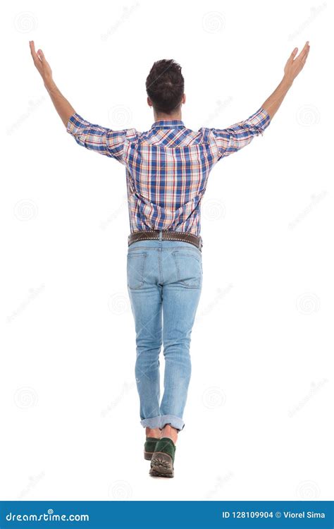 Rear View Of Casual Man Celebrating And Stepping Stock Photo Image Of