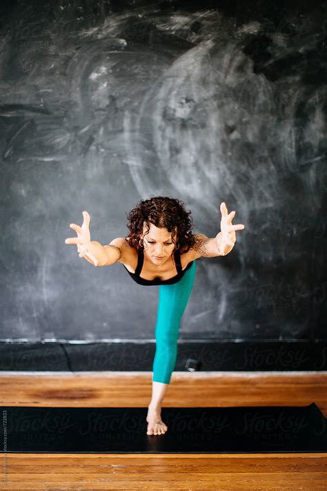 "Woman In Warrior Yoga Pose" by Stocksy Contributor "Abby Mortenson ...