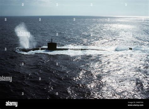 A port beam view of the nuclear-powered attack submarine USS PHOENIX ...