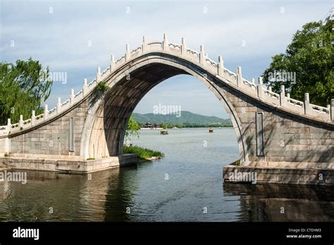 Chinese style arch bridge in Summer Palace Stock Photo - Alamy