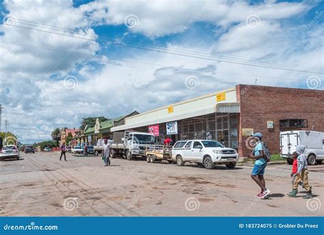 Street Scene, with Businesses, People and Vehicles, in Clocolan ...