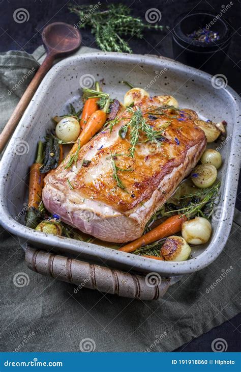 Traditional Roasted Dry Aged Veal Tenderloin With Carrots And Onions In