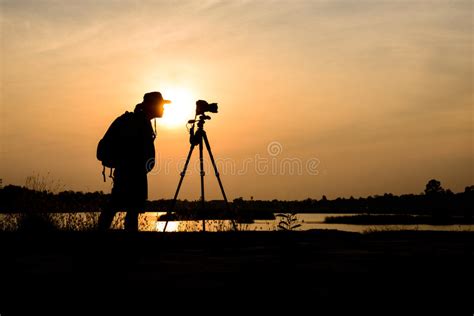 Silhouette Photographer in Sunset Background Stock Image - Image of ...