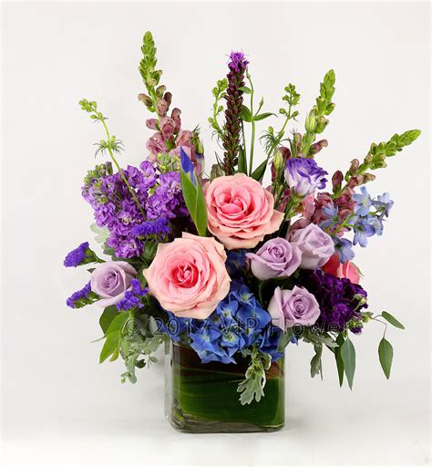 Pink And Blue Floral Arrangement Bluebells Daffodils Primroses And