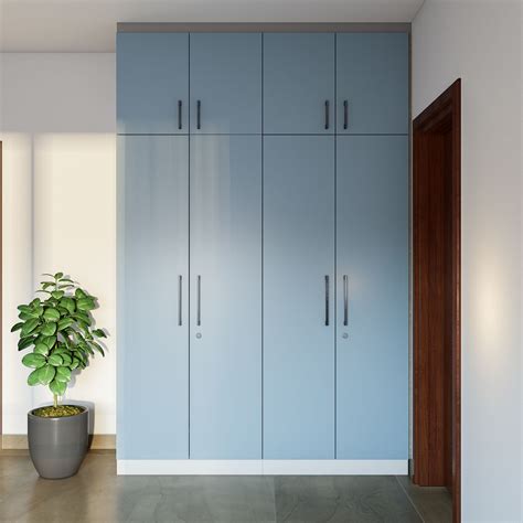 Sleek Modern Style Wardrobe Design With Pop Blue Laminate Livspace