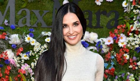 Demi Moore Rocks A Tiny Black Bikini As She Gets Drenched By A Waterfall