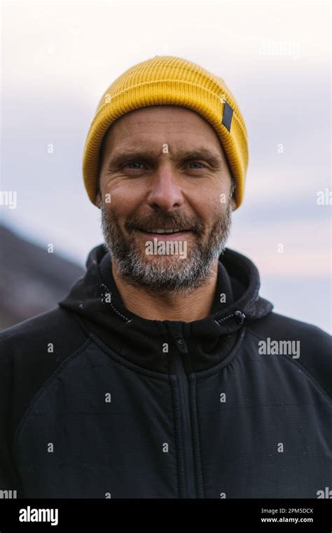 Portrait of a man climber in a hat with a flashlight on his head Stock ...