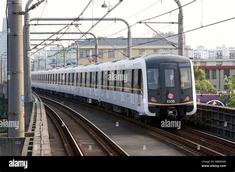 File A Subway Train Of The Shanghai Metro Line 3 Leaves A Station In