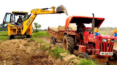 Jcb 3dx Backhoe Machine Working With Two Mahindra 475 Di Tractor For