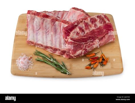 Raw Pork Ribs With Spices Salt And Rosemary On Wooden Background Pork