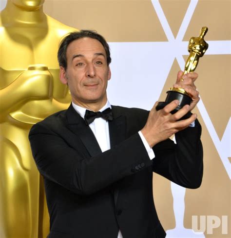 Photo Alexandre Desplat Wins Oscar For Best Original Score At The 90th