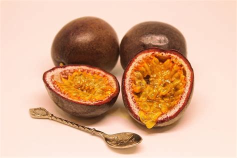 Juicy Passion Fruit Pulp Passion Fruits Whole And Cut In Half Stock