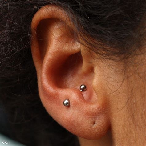 Anti Tragus Piercing by Andru | Ear piercings, Cute ear piercings ...