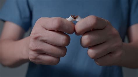 Woman stop smoke, destroy and smash on cigarette. wold tobacco day and