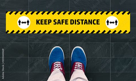 Vinyl floor signage for the new normal after the Covid-19 Stock Photo | Adobe Stock