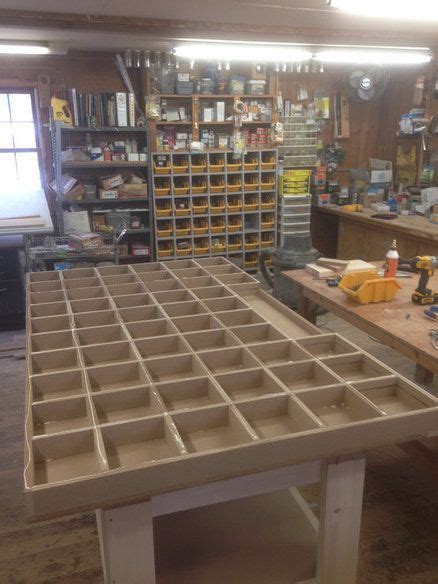 A Workbench With Tools And Supplies On It