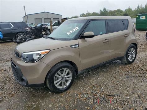 Report KNDJN2A27G7331404 KIA SOUL 2016 TAN GAS Price And Damage History