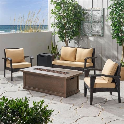 Noble House Honolulu Brown 5 Piece Faux Rattan Patio Fire Pit Set With