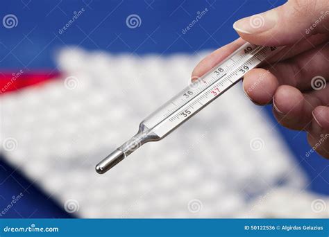 Medical Mercury Thermometer Showing Elevated Body Temperature Stock