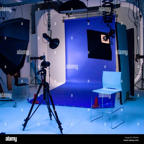 Photography Studio with a blue backdrop Stock Photo - Alamy