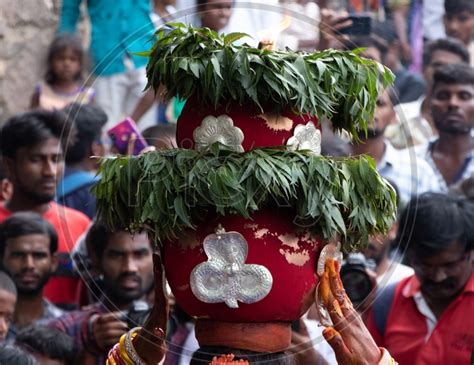 Image Of Woman Carrying Bonam On Head At Golconda Fort During Telangana