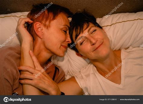 Mature Lesbian Couple Hugging Smiling While Lying Bed Home Stock Photo Vadymvdrobot