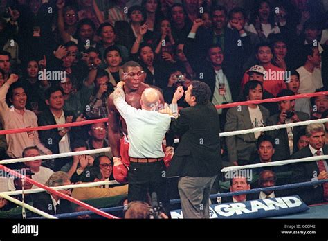 Referee Mills Lane Examines Frank Bruno After Stopping The Wbc