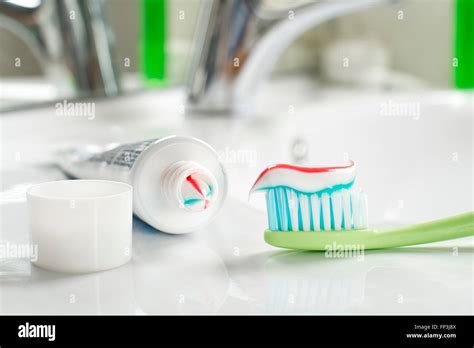 Toothbrush And Toothpaste In The Bathroom Close Up Stock Photo Alamy