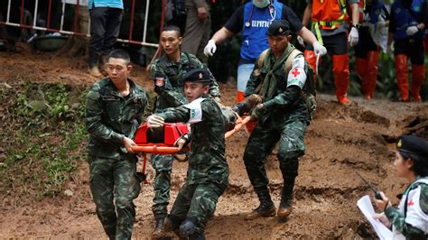 Thailand cave rescue: Divers search murky waters as search to find ...