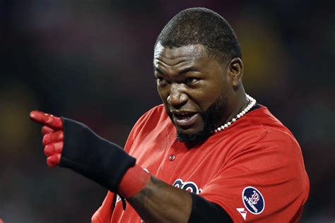 David Ortiz #34 of the Boston Red Sox points to the dugout after hitting a two-run single ...